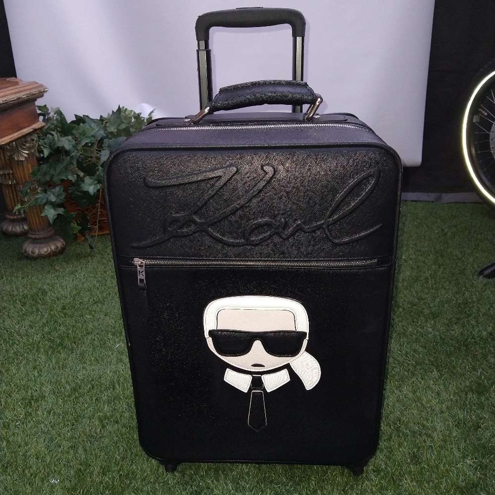 ✨Karl Legerfeld suitcase with adjustable handle.